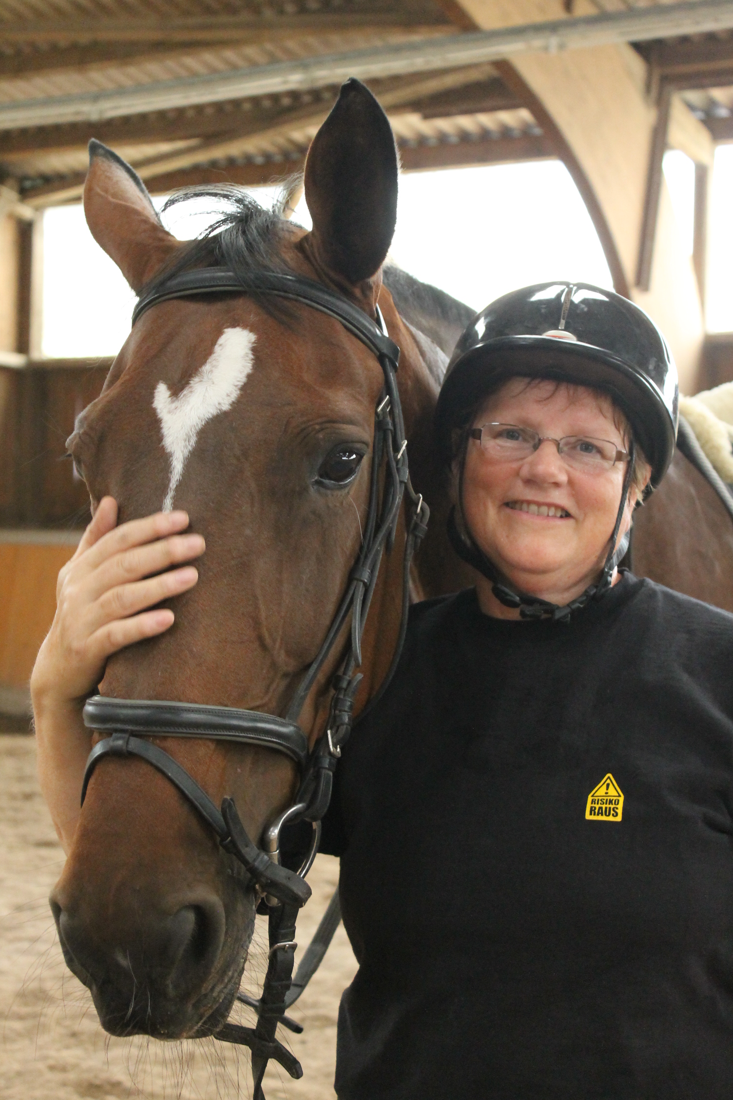 Pferd Riva mit Reiterin Eva